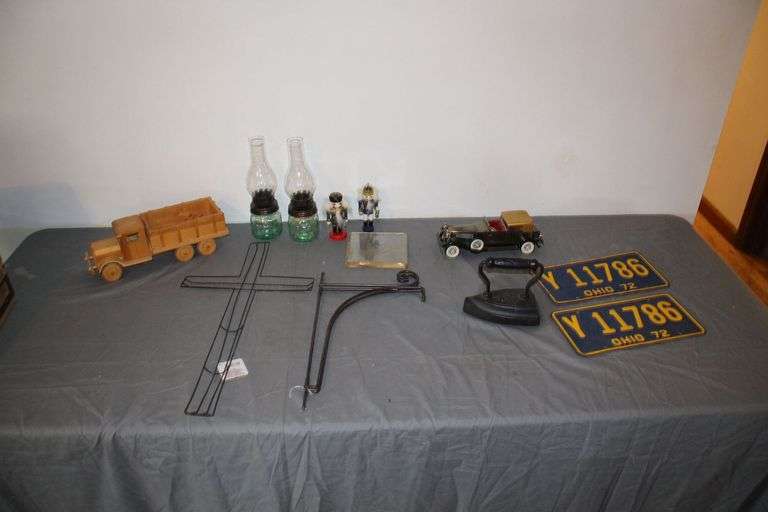 (2) Homestead Oil Lamps, (2) Nutcrackers, Wooden Pickup Truck, Cast Iron, License Plates, Model Car, and Misc. image