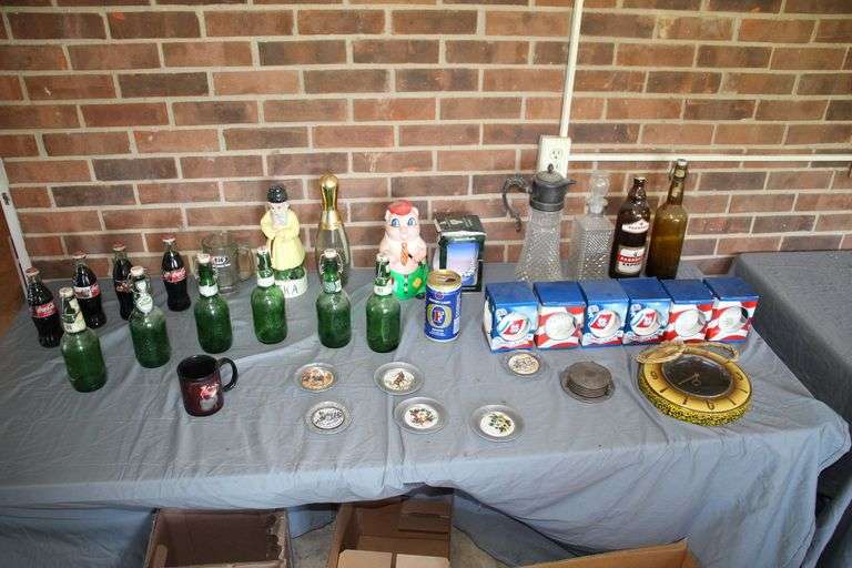 Coke Bottles, American Pride Ornaments, Coasters, Decanters, Pig Figure, A&W Glass Mug, Glass Bottles, and Misc image