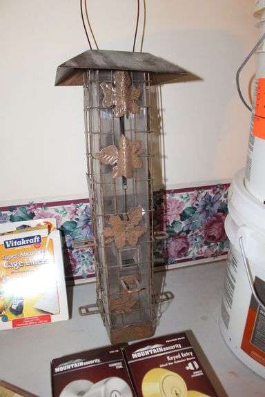 (2) Buckets of Base 2 Sealant, Bird Feeder, Rubber Tie Downs, Screws, Daisy 4x15 Scope, E Parker and Sons Fixed Blade Knife, Door Knobs, 18V Black and Decker Battery, and Misc.