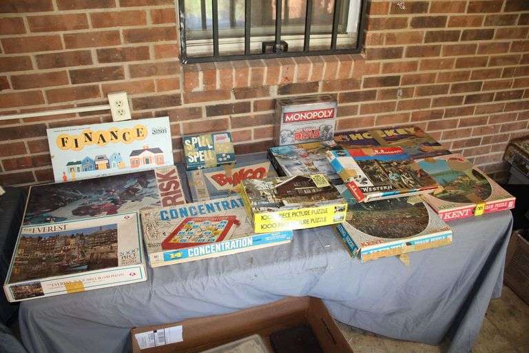 Sure Shot Hockey Game, Kent Jigsaw Puzzles, Monopoly, Risk, Finance Board Game, Shoots and Ladders, and Misc Jigsaw Puzzles image