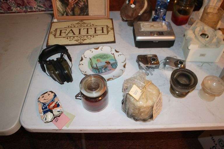 Saint Figurines, Decorative Plate, Glass Insulator, Glass Pitcher, Digital Cameras, and Misc. Decorations