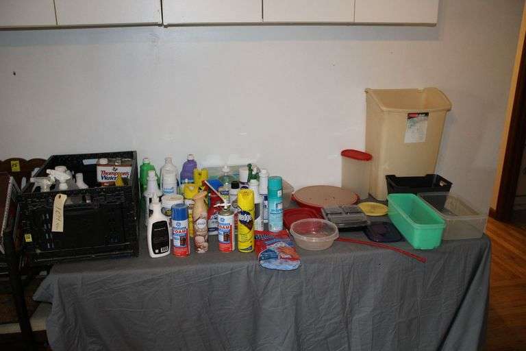 Cleaning Supplies, Tupperware Containers, and Water Sealer image
