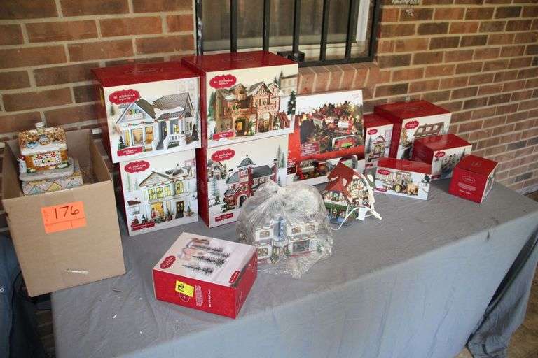 St. Nicholas Townhomes, St. Nicholas Figurines, Home Accents Holiday Train Set, and St. Nicholas Trees and Village Decor image