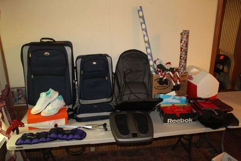 (2) American Tourister Suitcases and Hand Bag, Christmas Wrapping Paper, Temp Rite Massage Cushion, Grapper, Size 10 Nike Shoes, Playmate Cooler, Hand Bags, Naipo Foot Massager, and Misc. image