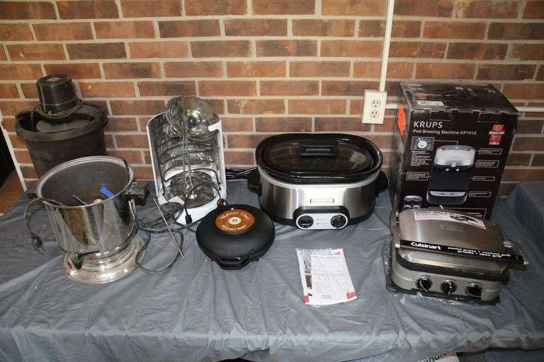 Electric Mediterranean Rotisserie Grill, Cuisinart Griddler, Crofton Deluxe Twin Rotisserie Oven, Sunbeam Ice Cream Maker, Master Chef Donut Bakery, Regal Ware Stainless Urn, Krups Pod Brewing Machine, and KitchenAid Slow Cooker image