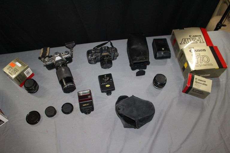 Canon AE-1 Camera, Canon T70 Camera, Canon 35 Lens, Canon Speedlite 277T Flash, Canon Speedlite 155A Flash, and Canon 50mm Lens image