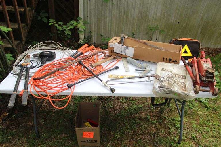 1/2 In Craftsman Drill, (2) Electrical Cords, Cable, 4 Way Tire Tool, Pruners, 2 Ton Floor Jack, Claw Hammer, Square, Crow Bar, Hand Saw, and Misc. image