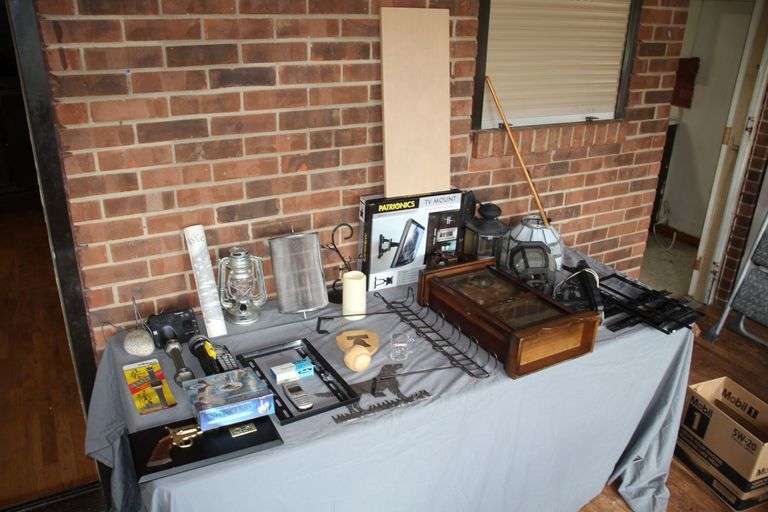 TV Mount, Outdoor Lights, Over the Door Shoe Rack, Wangja 31 Day Mantle Clock, Wall Decor, Flashlight, Phone, Battery Operated Lantern, and Misc. image