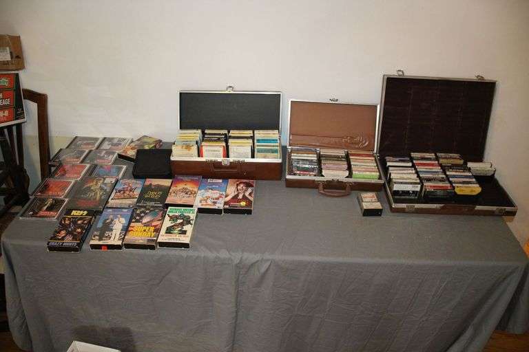 VHS Tapes, (2) Various Sized Cassette Cases, (1) 8 Track Tape Case, CDs, Cassette Tapes, and 8 Track Tapes image