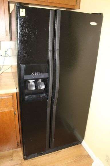 Whirlpool Side by Side Refrigerator with Ice and Water Dispenser image