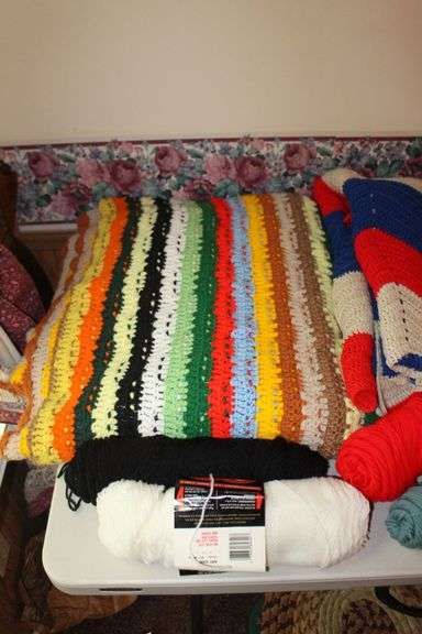 Various Colored Yarn, Afghans, and Blankets