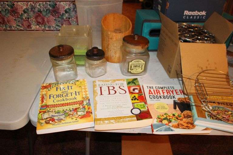 Cake Plate Carrier, Tins, Thomas Collector Edition Radio, Glass Canisters, Plastic Canisters, Framed Puzzle, Yard Stick, Books, and Misc.