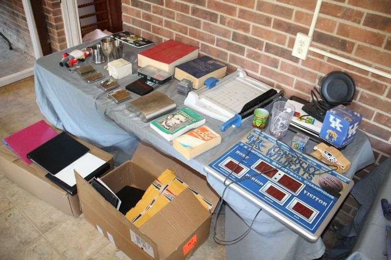 (4) Various Sized Flasks, Sewing Kit, Paper Cutter, License Plates, Physicians Desk Reference Books, Lighter, 8 in 1 Screwdriver Flashlight, Kentucky Wildcat Score Board, Paper Bags, and Misc image