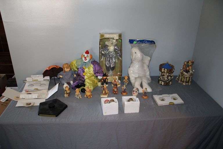 Clown Dolls, Goebel Figurines, Musical Carousel, and Stuffed Rabbit image