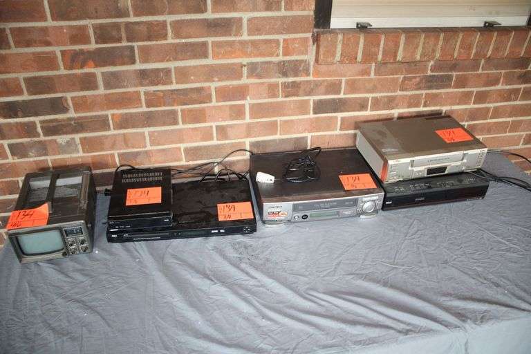(2) Allvol DVD Players, Bentley TV/Radio, Hitachi VHS Player, Sanyo VHS Player, and RCA Video Cassette Recorder image