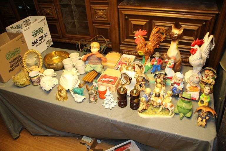 (2) Rooster Figurines, Salt and Pepper Grinders, Grandma and Grandad in Rockers Coin Bank, Figurines, Strutting Turkey Container, Metal Basket, Sea Shells, and Misc image