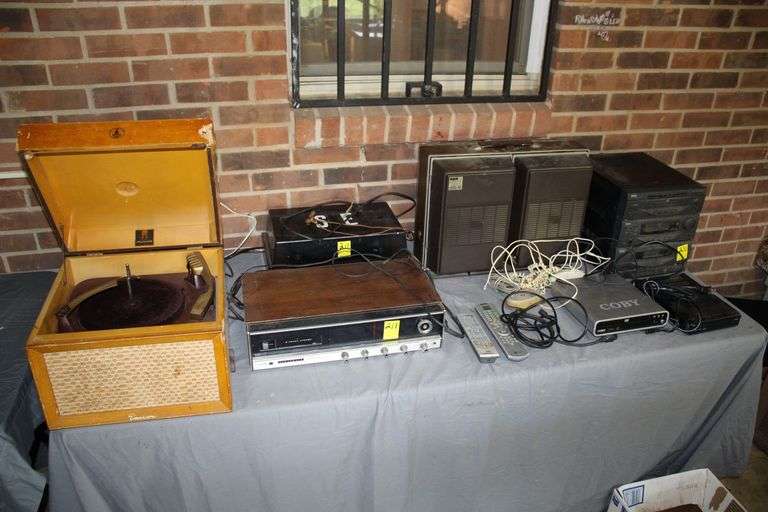 Panasonic Turn Table, Panasonic FM-AM Multiplex, RCA 3 Disc Radio, RCA Solid State 50 Turn Table with Speakers, Allvol DVD Player, Coby DVD Player, and Emerson Phonoradio image