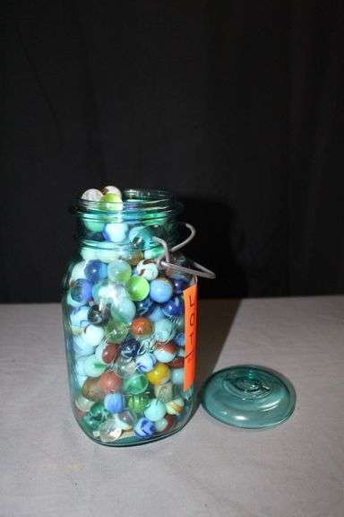 Full Jar of Various Sized Marbles image