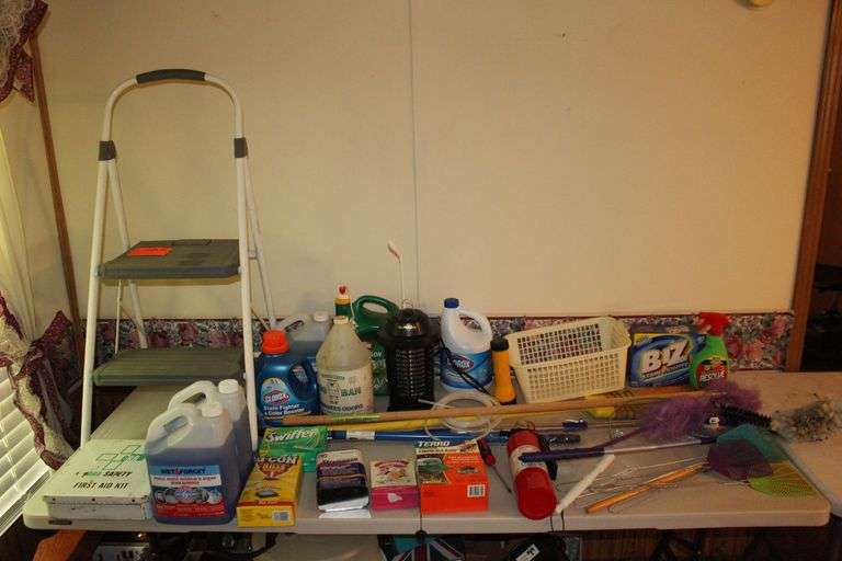 Cosco Step Stool, Broom, Mop Handle, Dunaga Bug Light, First Aid Kit, Fly Swatters, Wet Forget Stain Remover, Ortho Weed Killer, Dusters, and Misc. image