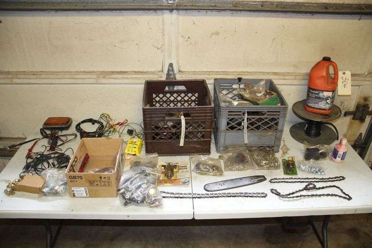 (2) Milk Crates, Electrical Wire on Sproil, Various Sized Bolts, 12 Inch Chainsaw Bar, Nuts, and Misc image