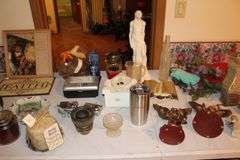 Saint Figurines, Decorative Plate, Glass Insulator, Glass Pitcher, Digital Cameras, and Misc. Decorations