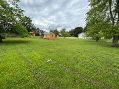 0.40 ACRE LOT - STORAGE BUILDING - OUTBUILDING