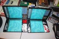 X-Acto Paper Cutter, Monopoly Games, Jigsaw Puzzles, Board Games, Wii Fit Board, Cassette Case, Cassettes, Sony Cam Recorder, Oculus VR Headset and Remote, and Misc.