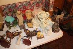 Saint Figurines, Decorative Plate, Glass Insulator, Glass Pitcher, Digital Cameras, and Misc. Decorations