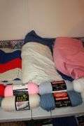 Various Colored Yarn, Afghans, and Blankets