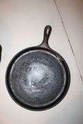 10.5 Inch Cast Iron Skillet, No.7 10.5 Inch Cast Iron Skillet, and Lodge 10.5 Inch Cast Iron Flat Top