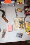 (2) Buckets of Base 2 Sealant, Bird Feeder, Rubber Tie Downs, Screws, Daisy 4x15 Scope, E Parker and Sons Fixed Blade Knife, Door Knobs, 18V Black and Decker Battery, and Misc.