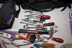 Ball Peen Hammer, Tool Kit, Speed Square, Claw Hammer, Caulk Gun, Pliers, Electrical Tester, Levels, Combination Wrenches, Tool Bags, and Misc.