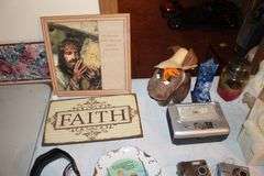Saint Figurines, Decorative Plate, Glass Insulator, Glass Pitcher, Digital Cameras, and Misc. Decorations