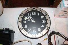 Kruger and Sports Wall Clocks, Sound Design Radio, Back Scratcher, CB Radio, Whistler Scanner, Electrical Wire, and Misc.