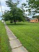 0.40 ACRE LOT - STORAGE BUILDING - OUTBUILDING