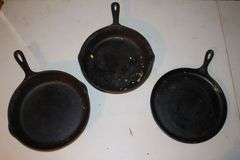 10.5 Inch Cast Iron Skillet, No.7 10.5 Inch Cast Iron Skillet, and Lodge 10.5 Inch Cast Iron Flat Top