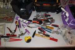 Ball Peen Hammer, Tool Kit, Speed Square, Claw Hammer, Caulk Gun, Pliers, Electrical Tester, Levels, Combination Wrenches, Tool Bags, and Misc.
