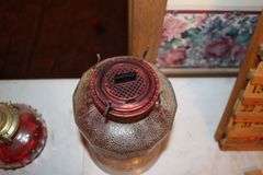 (2) Oil Lamps with Globes, Oil Lamp Base, (3) Rollers, Lamp Oil, Iron, Glass Goblet, and Wooden Calendar