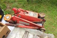 1/2 In Craftsman Drill, (2) Electrical Cords, Cable, 4 Way Tire Tool, Pruners, 2 Ton Floor Jack, Claw Hammer, Square, Crow Bar, Hand Saw, and Misc.