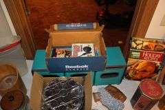 Cake Plate Carrier, Tins, Thomas Collector Edition Radio, Glass Canisters, Plastic Canisters, Framed Puzzle, Yard Stick, Books, and Misc.