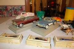 (5) Chevron Commemorative Model Cars, Impala and Corvette Model Cars, M&M Dispenser, Toys, Lego Block Coin Bank, and Misc.