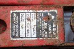 1/2 In Craftsman Drill, (2) Electrical Cords, Cable, 4 Way Tire Tool, Pruners, 2 Ton Floor Jack, Claw Hammer, Square, Crow Bar, Hand Saw, and Misc.