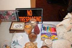 Maple's Regulator Wall Clock, Welcome Hand Saw Decoration, Candles, No Trespassing Sign, Candy Dish, (2) Electric Lamps with Globes, and Misc.