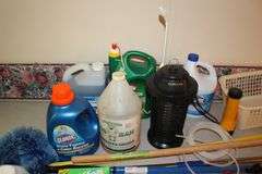 Cosco Step Stool, Broom, Mop Handle, Dunaga Bug Light, First Aid Kit, Fly Swatters, Wet Forget Stain Remover, Ortho Weed Killer, Dusters, and Misc.