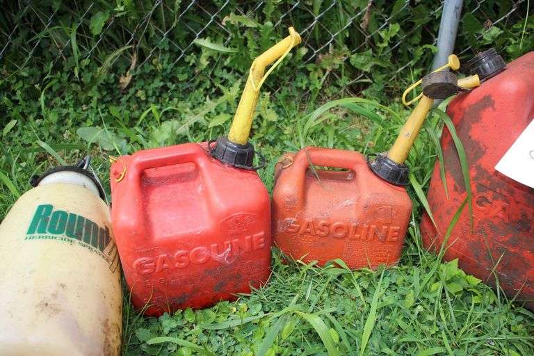 1 Gallon Gas Can, (2) 2 Gallon Gas Cans, 5 Gallon Gas Can, and (2) Sprayers