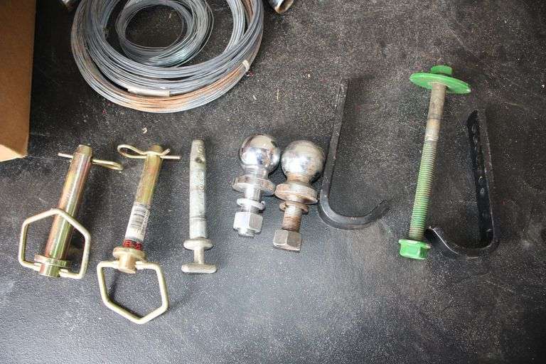 (2) 1 7/8 Inch Balls, Hitch Pins, 4-Way Lug Wrench, Wire, and Misc.