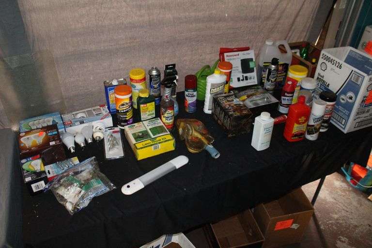 Light Bulbs, Watering Can, Cleaning Wipes, Pressure Washer Concentrate, Glass Cutting Board, Brush, and Misc. image