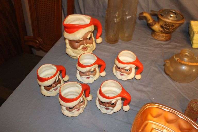 Santa Claus Mugs, Candy Dish, Glass Pitcher, Fondue Pot, Cake Mold, Candle Holders, Peculator, Canisters, and Misc.