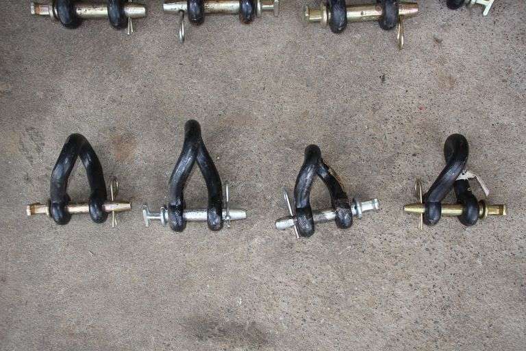 (3) 1 x 5 5/16 Clevises, (4) Twisted Clevises, 15/16 x 4 5/8 Clevis, and 7/8 x 3 1/4 Clevis