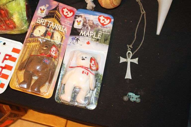 Easy Stitch Sewing Machine, Seamstress Garmet Steam Iron, Wall Decorations, (2) Electric Irons, License Plate, Peanuts Figurines, and Misc.